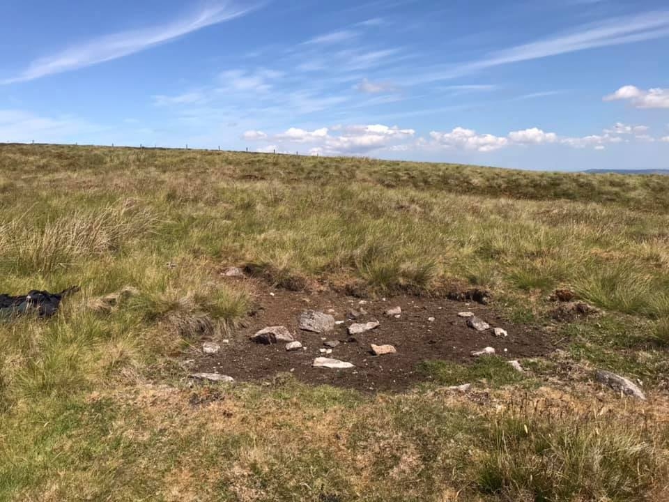 The bare patch on the hilltop where the Halifax ended up after first striking the slope in a steep climb about 100 yards further down the hill.